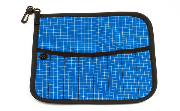The front of a Tool Pen Wrap in Island (blue with white grid) 200 Halcyon.